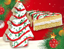 Image of Little Debbie Christmas Tree Cakes, one standing and one cross section showing cake icing.