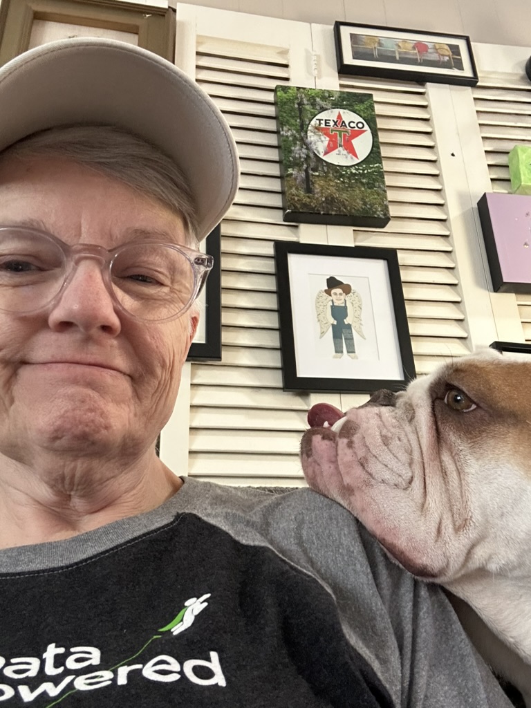 Image of Ugena Whitlock and bulldog.